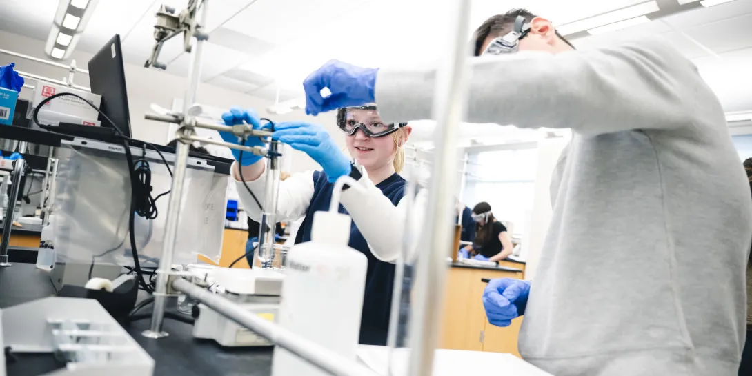 Chemistry students working together in a lab.