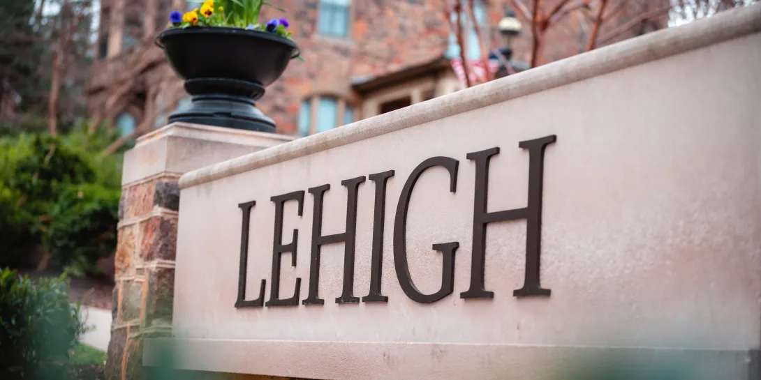 Lehigh sign with flowers.