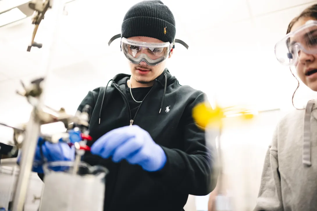 Chemistry students in a lab working together.